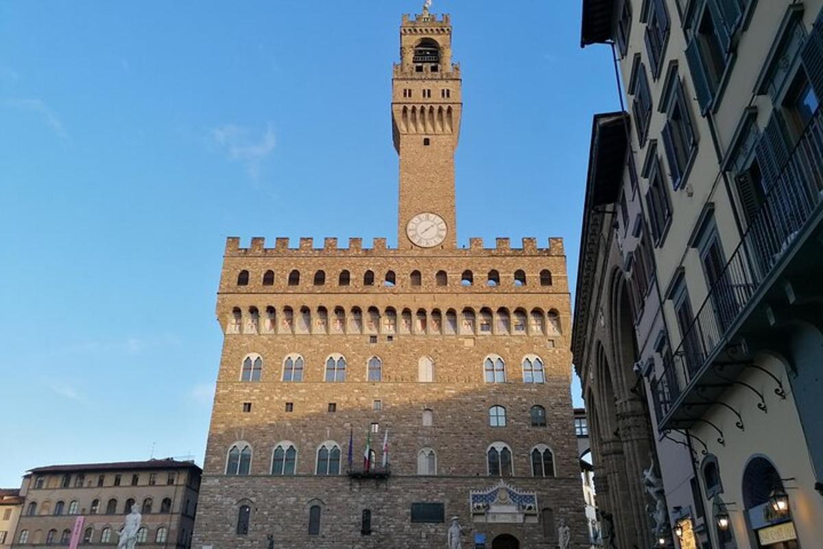 a tall building with a clock tower on top of it