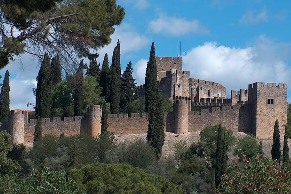 a large castle sitting on top of a hill