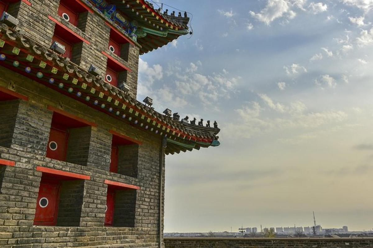 a building with birds sitting on top of it