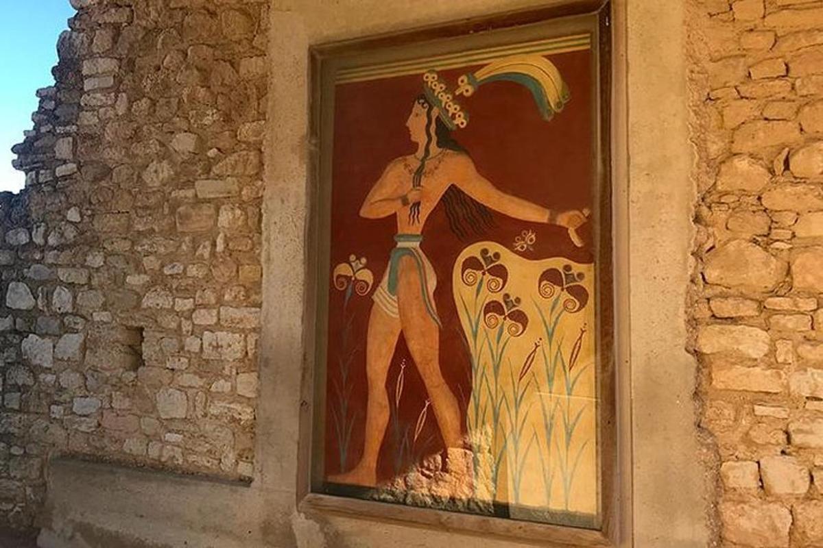 uma pintura de uma mulher com um arco-íris na parede