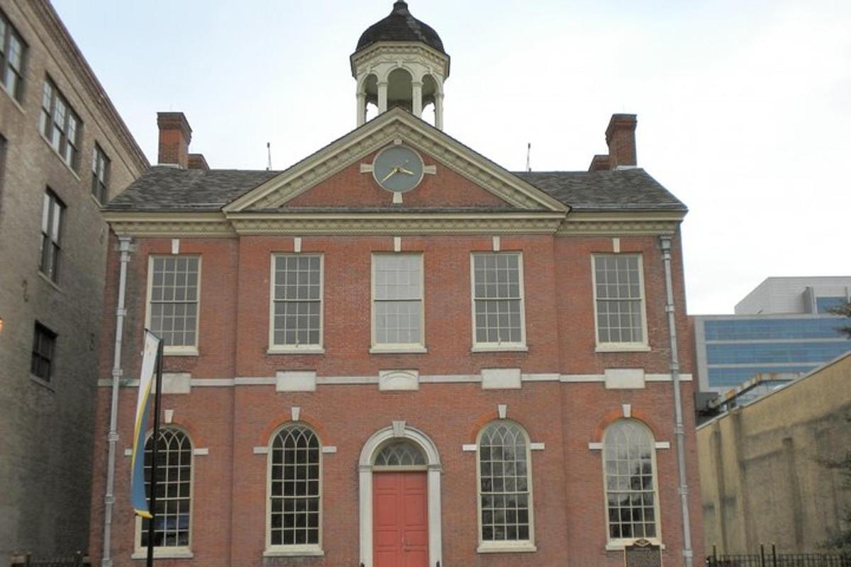 a red brick building with a clock tower on top