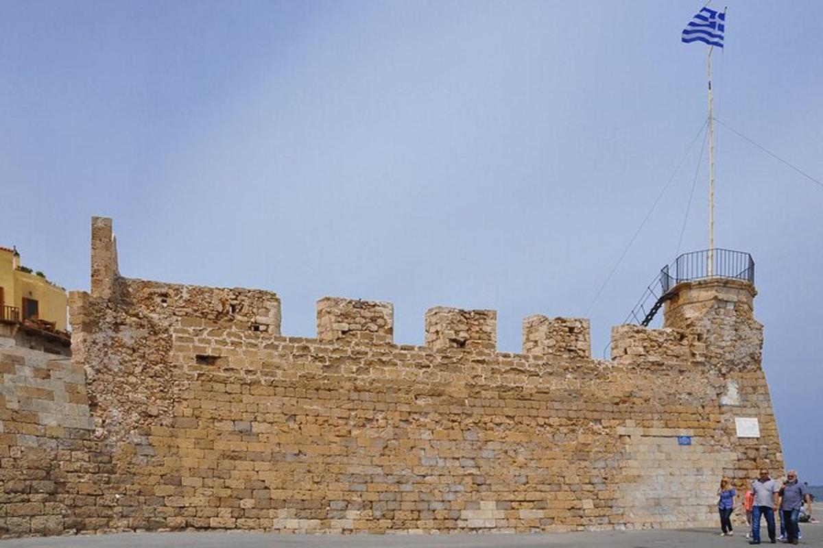 un castell amb una bandera a sobre