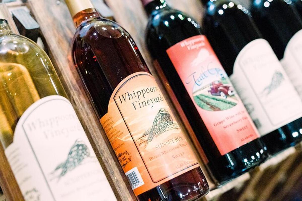 a group of wine bottles sitting on a shelf