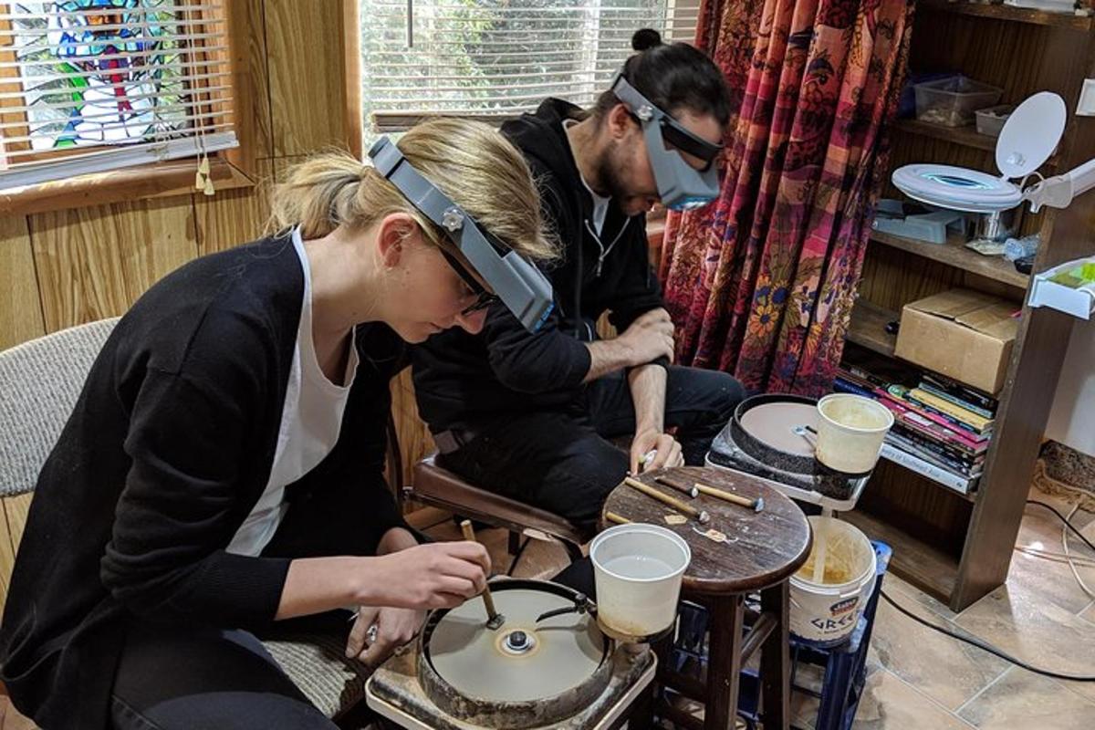 a man and a woman playing a drum set