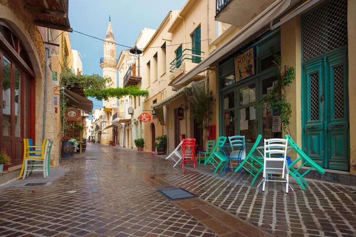 a group of colorful chairs sitting on a street