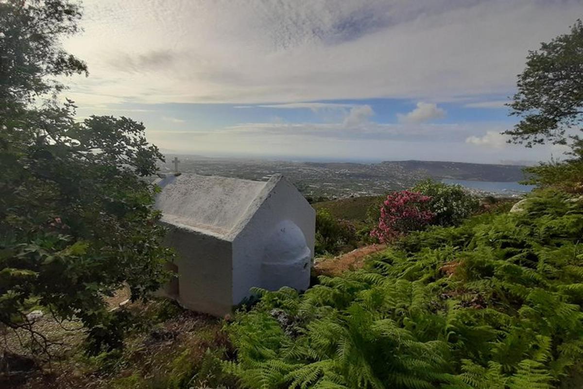 a building sitting on the side of a hill