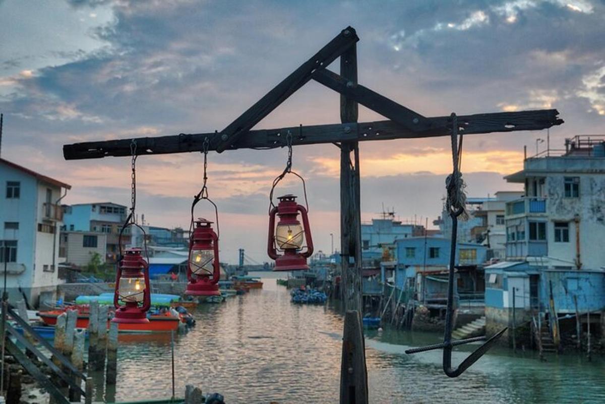 a group of trolleys are hanging over a river