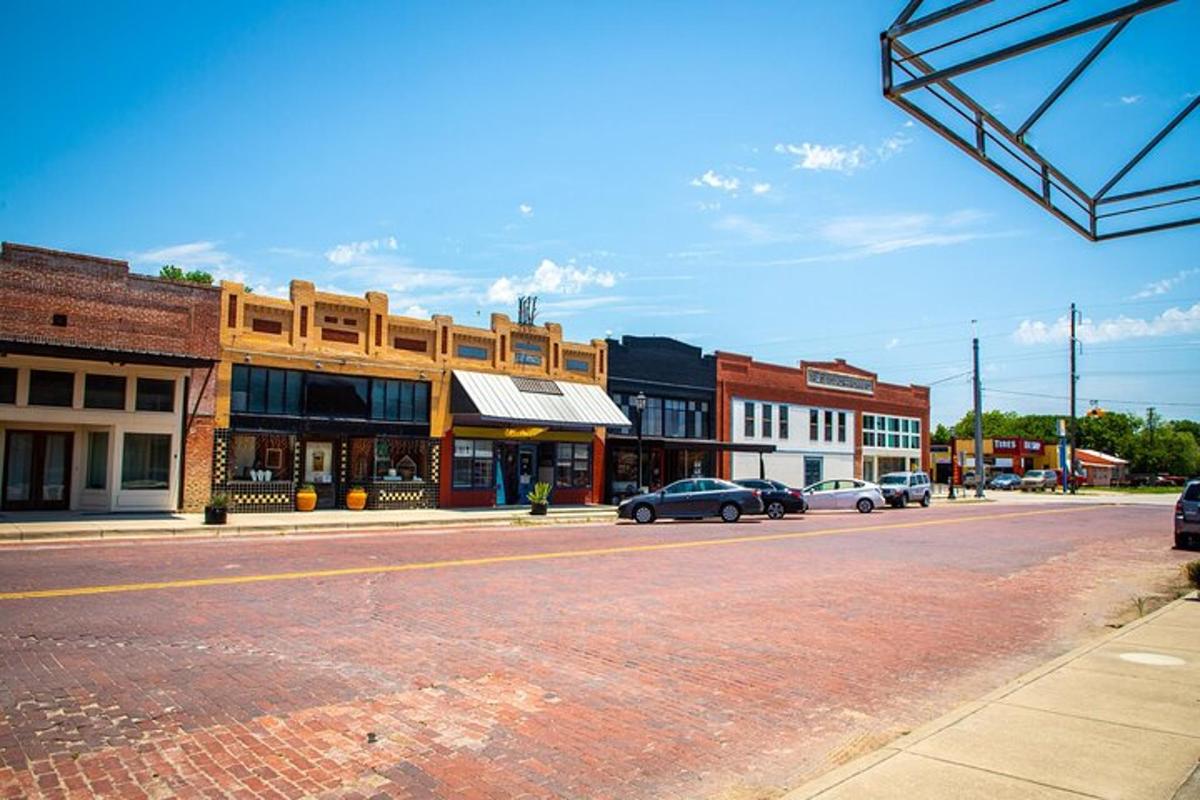 an empty street in a small town with buildings