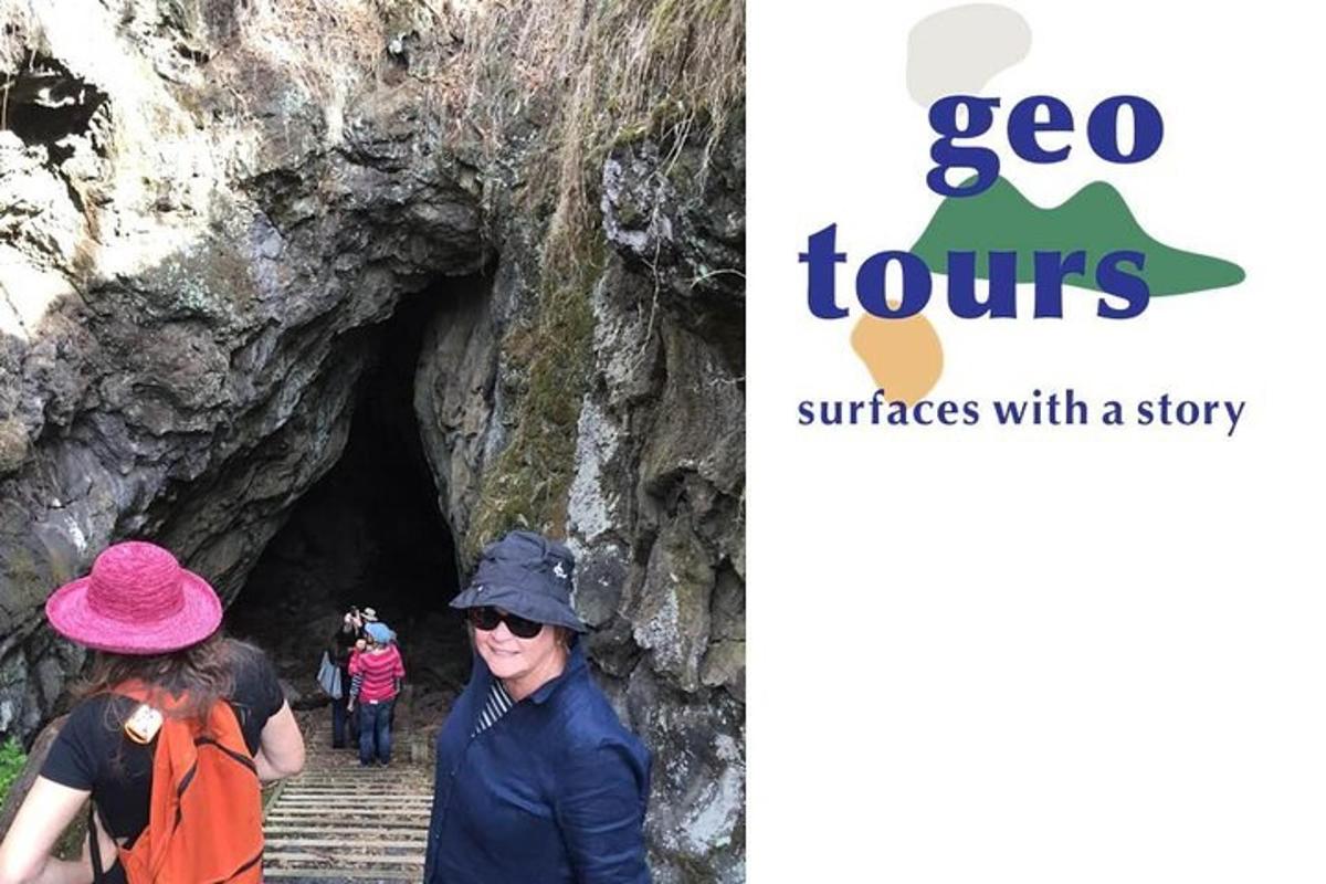 a group of people walking into a cave
