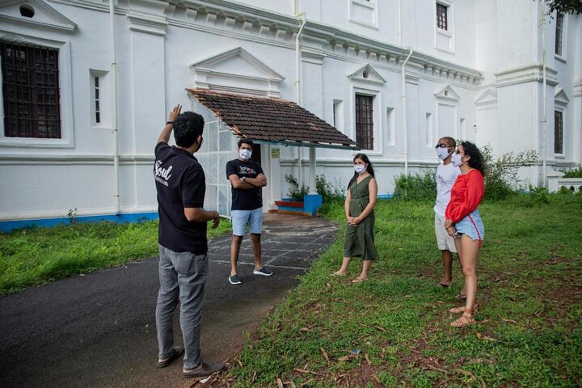 a group of people standing in front of a building