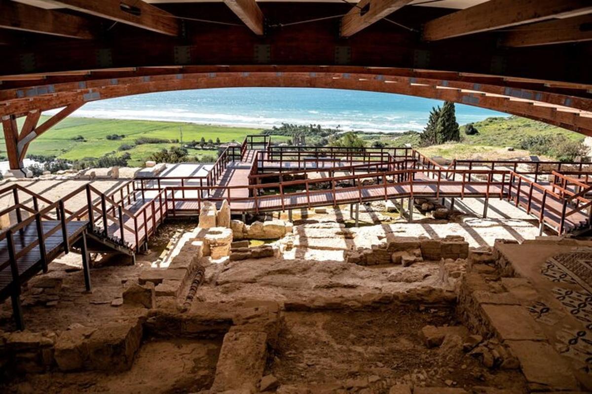 a view from inside of a building with an arch