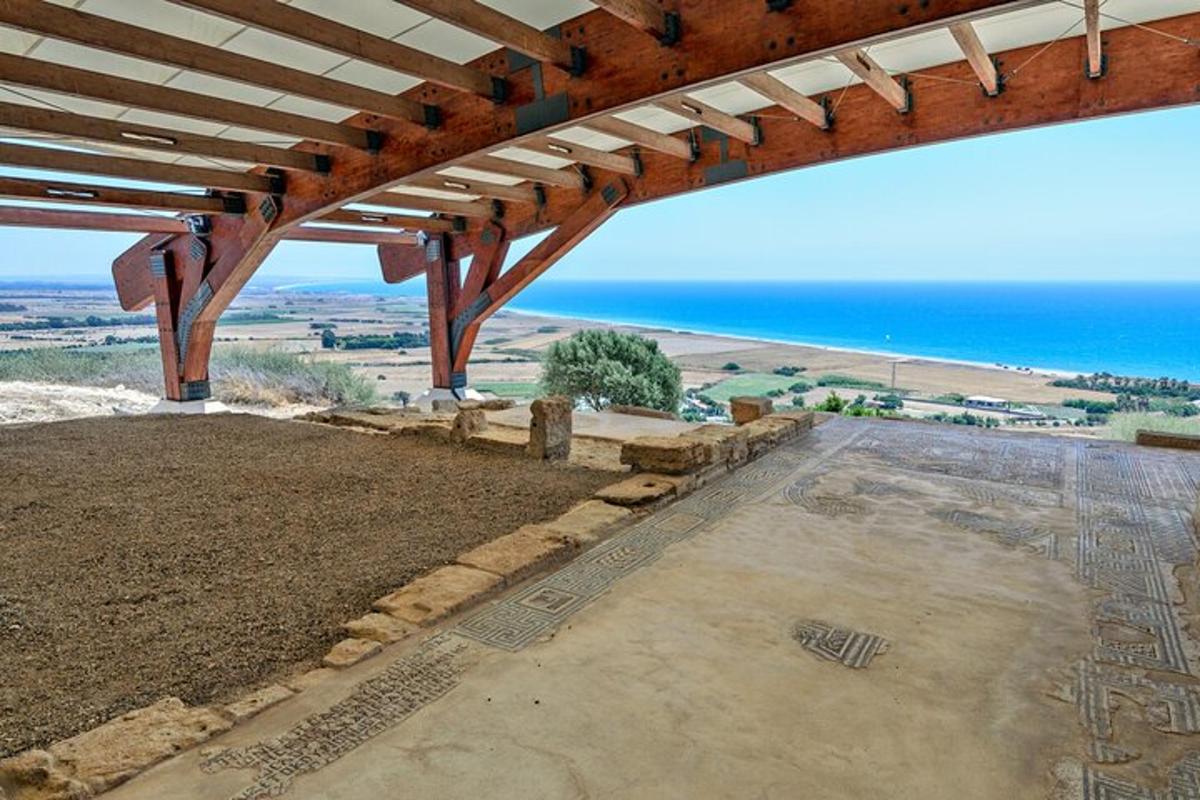 a patio with a view of the ocean