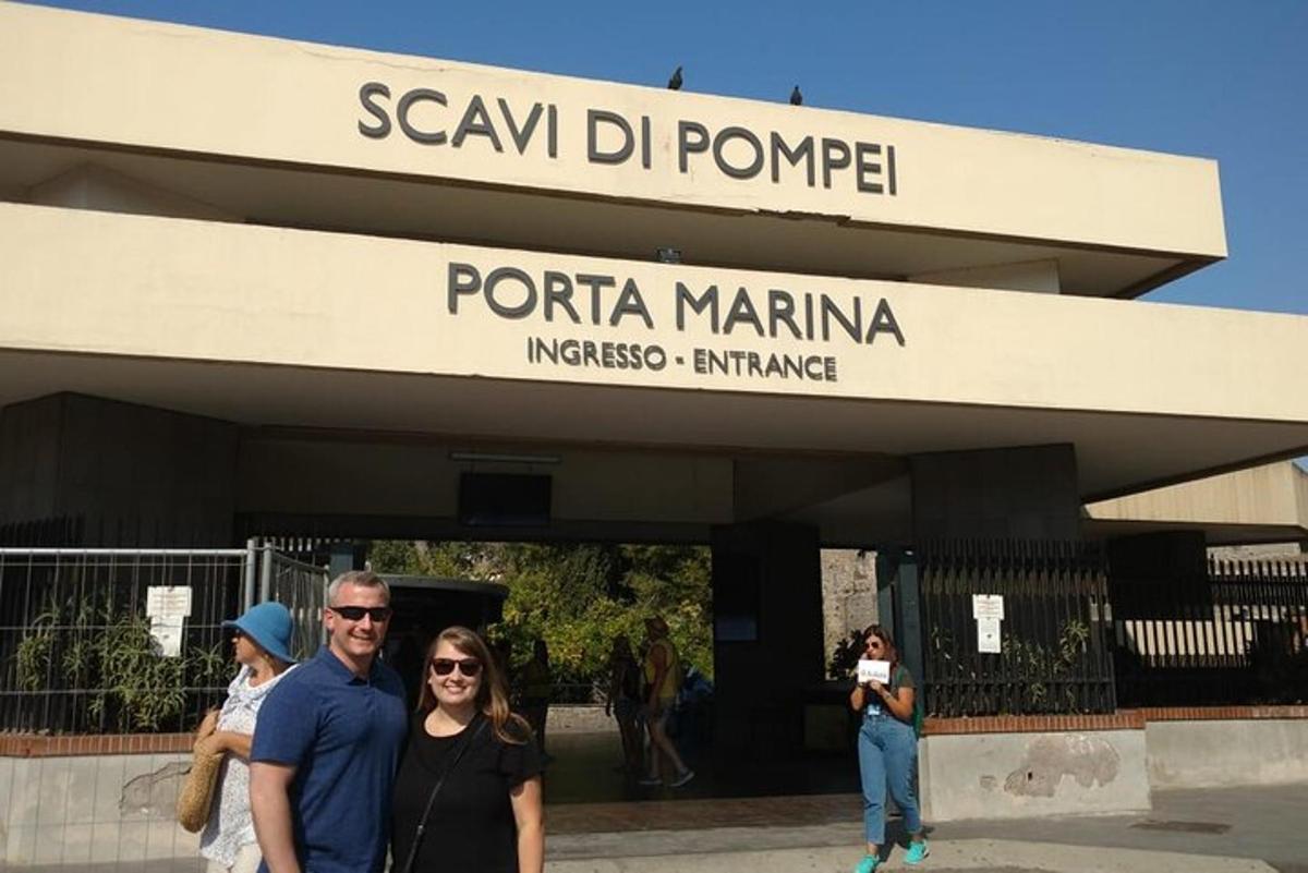 a group of people standing in front of a building