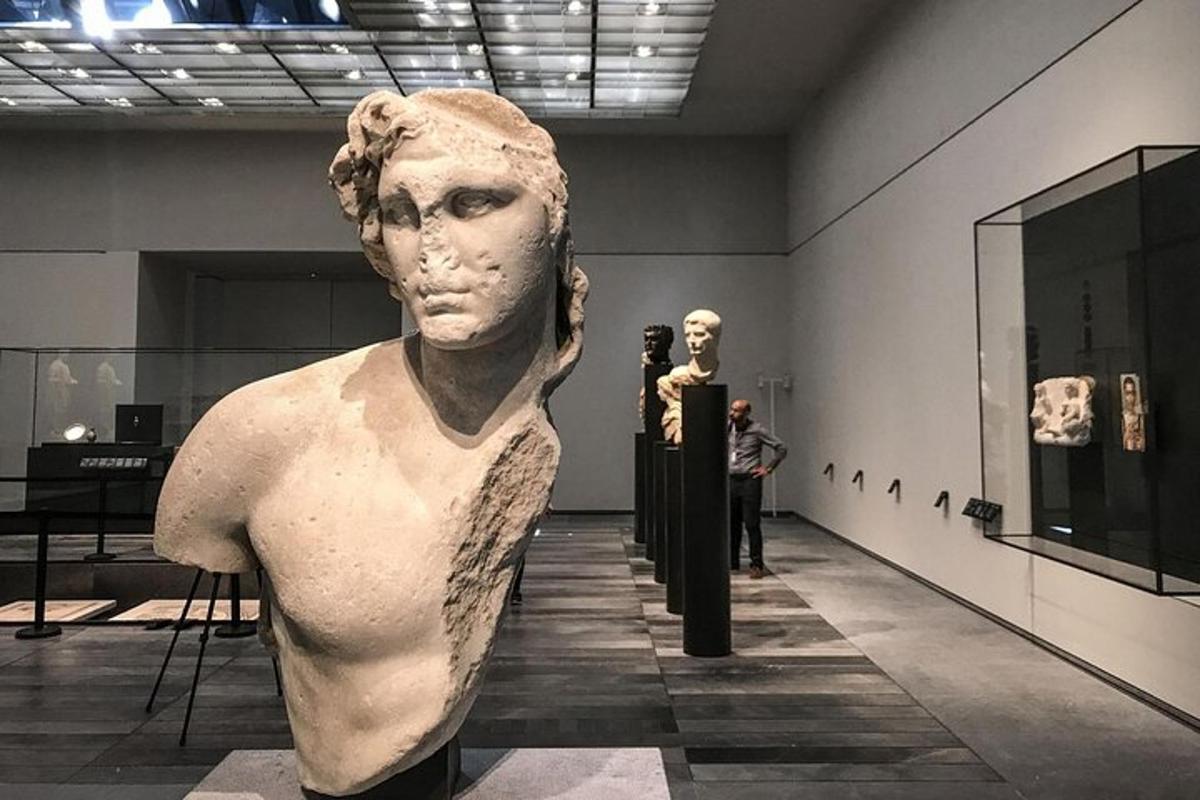 a statue of a woman on display in a museum