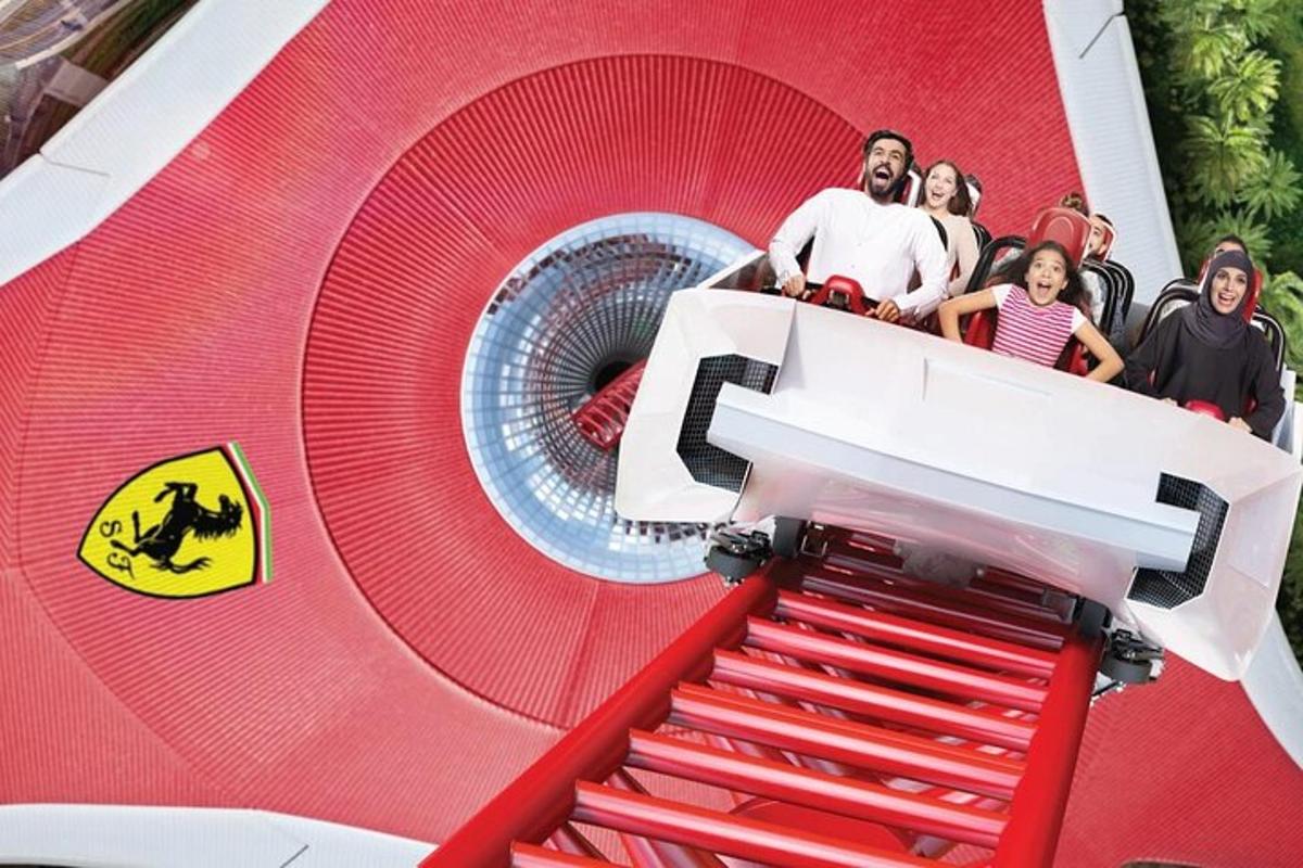 a group of people standing on a red spiral staircase