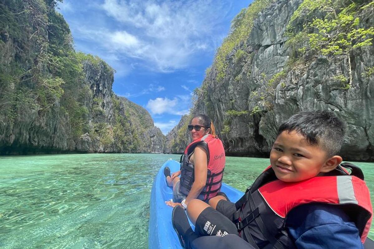 a woman and a boy on a raft in the water
