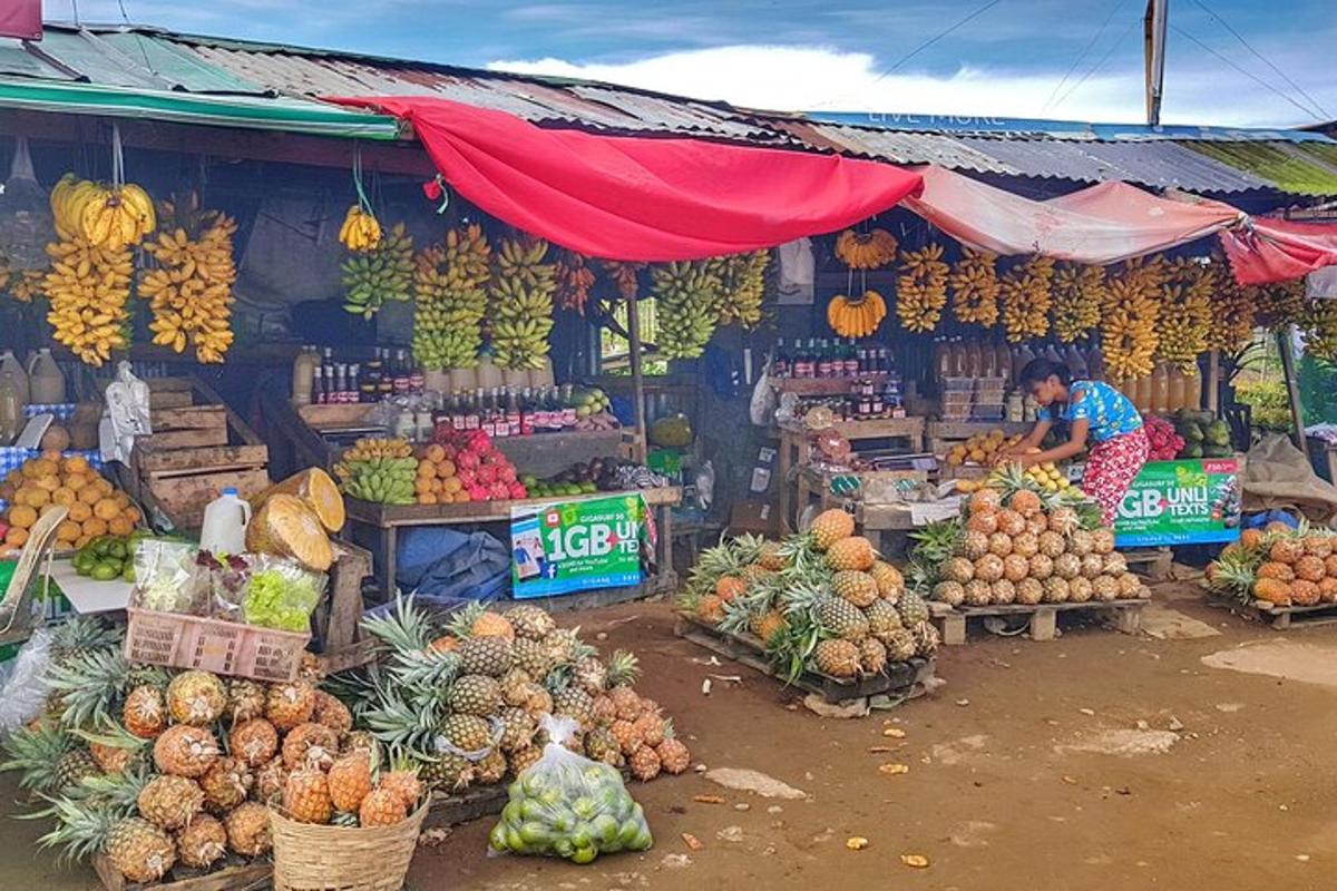 a market with a bunch of fruits and vegetables