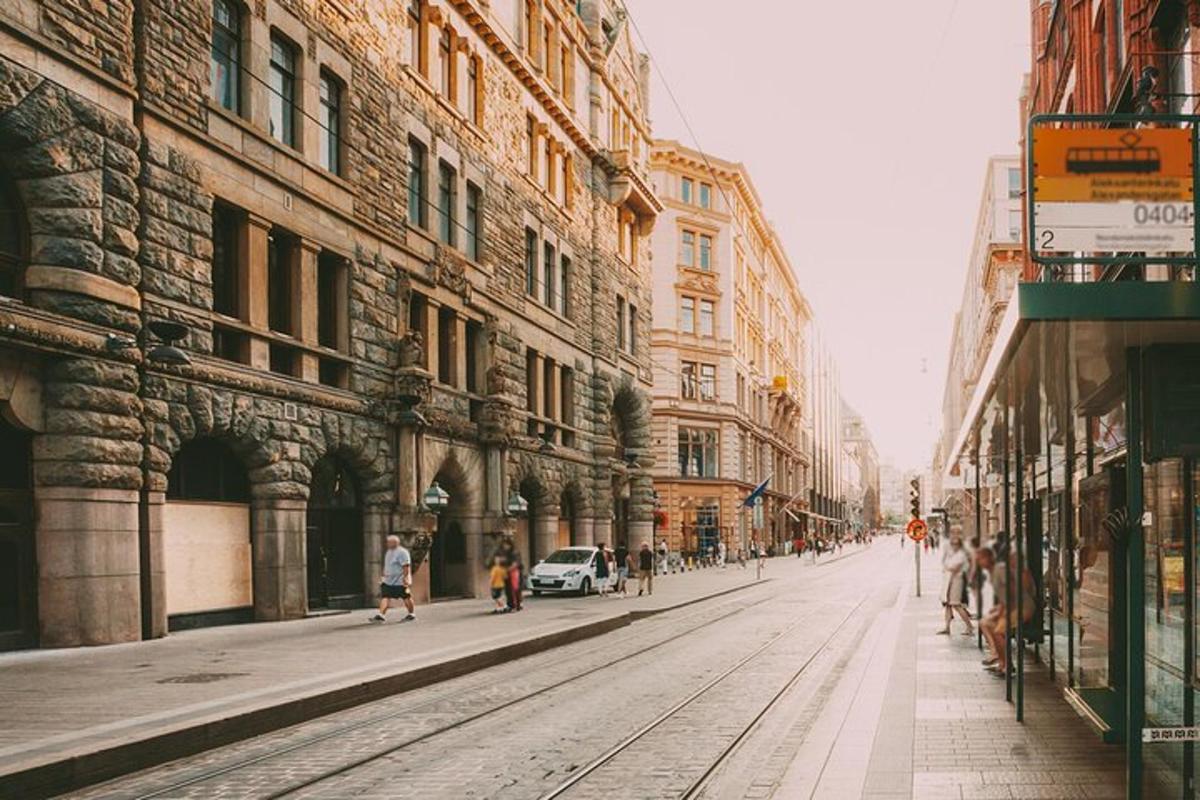 a city street with buildings and people walking on the street