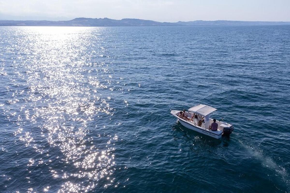 a boat in the middle of a large body of water