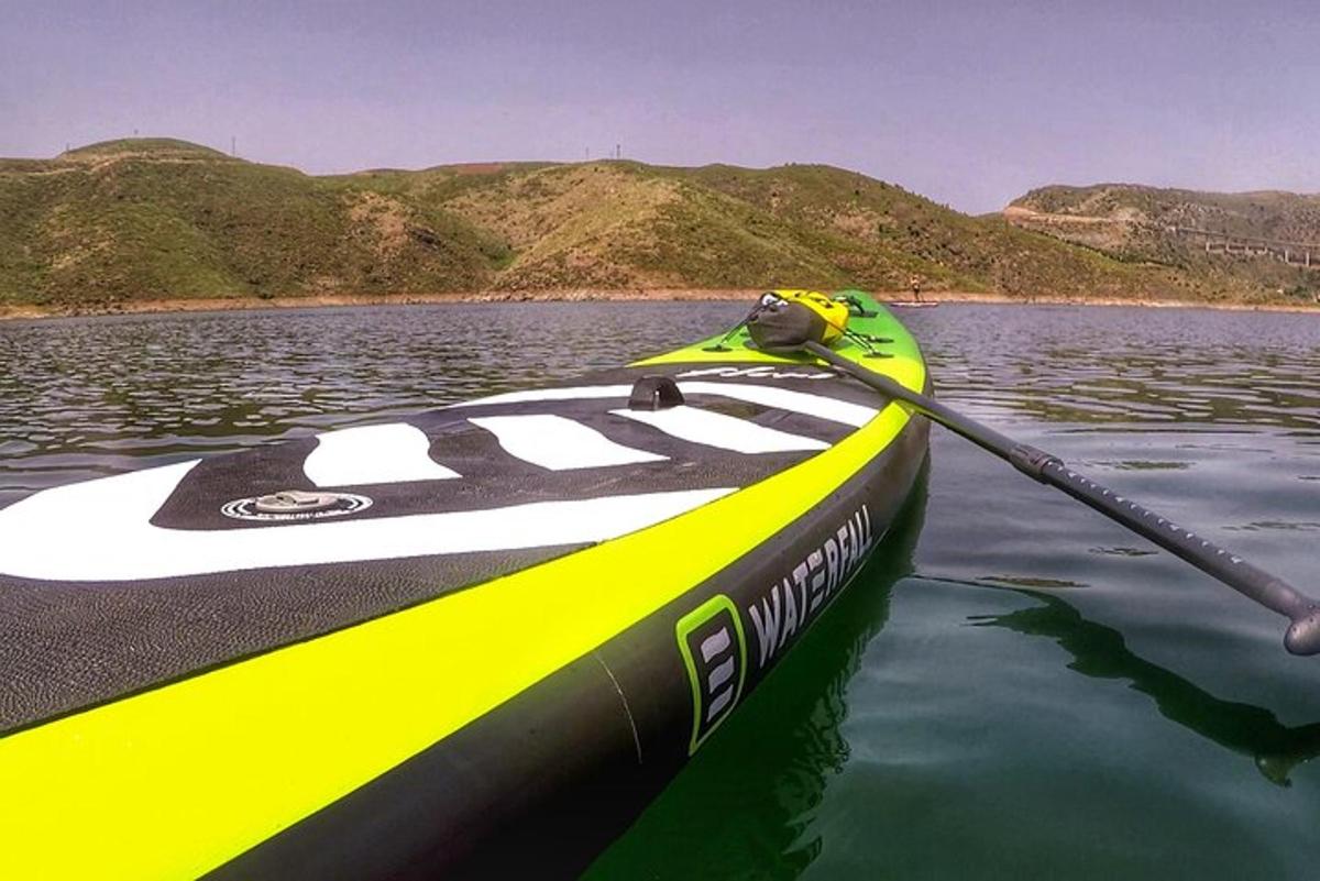 a boat with a paddle in the water