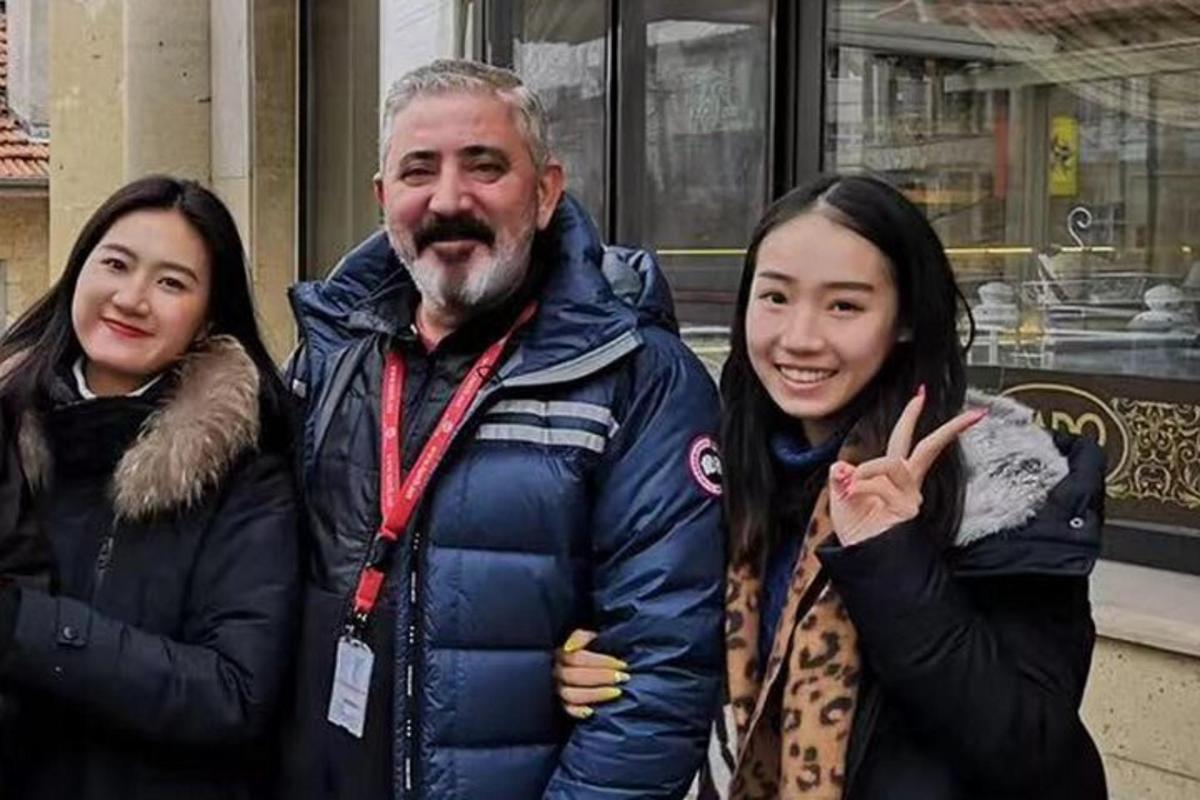 a man and two women posing for a picture