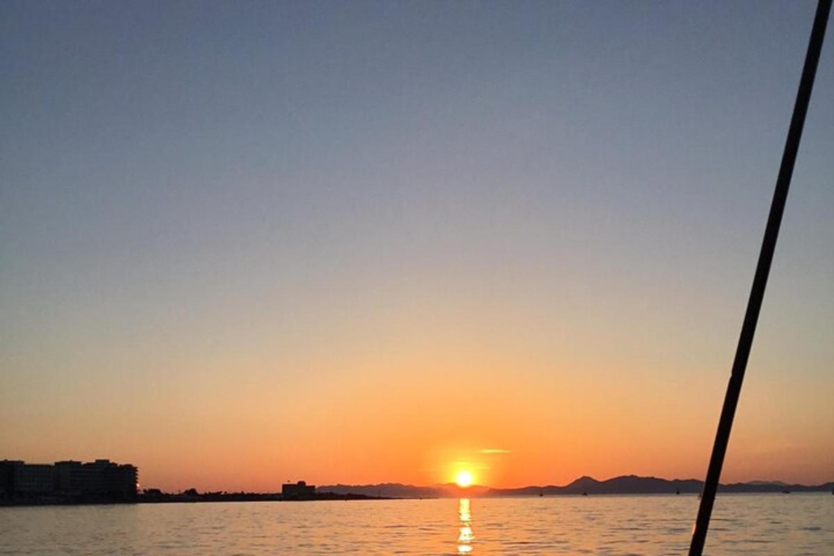 a view of the sunset from a boat