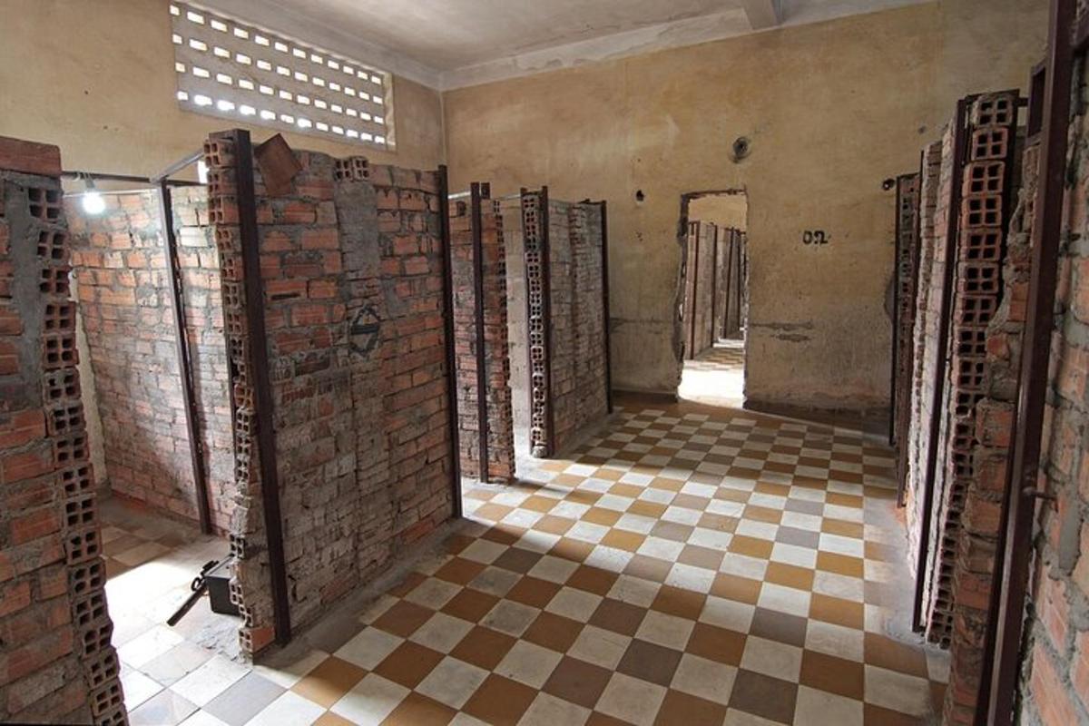 an empty room with a checkered floor