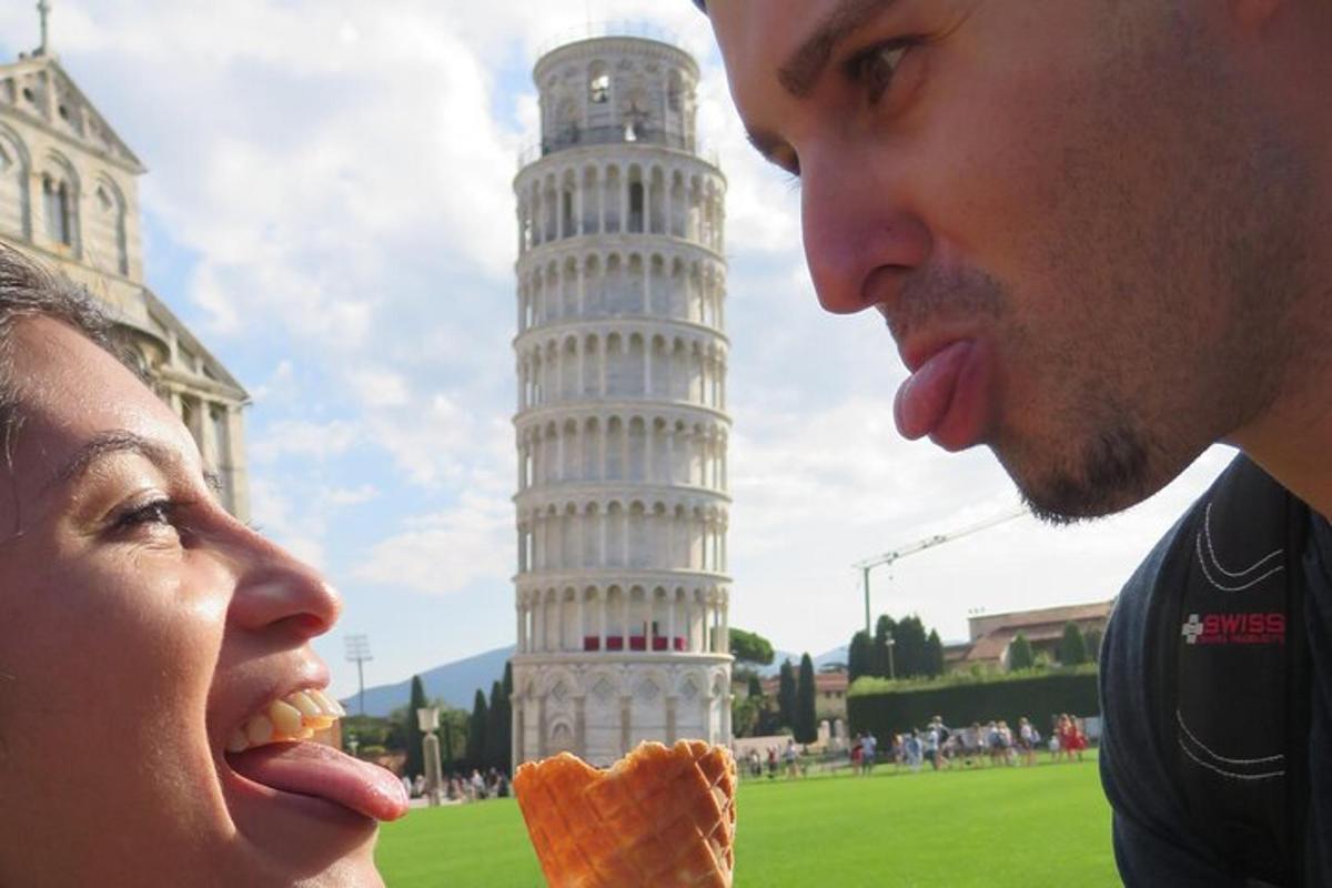 a man and woman feeding each other a piece of food
