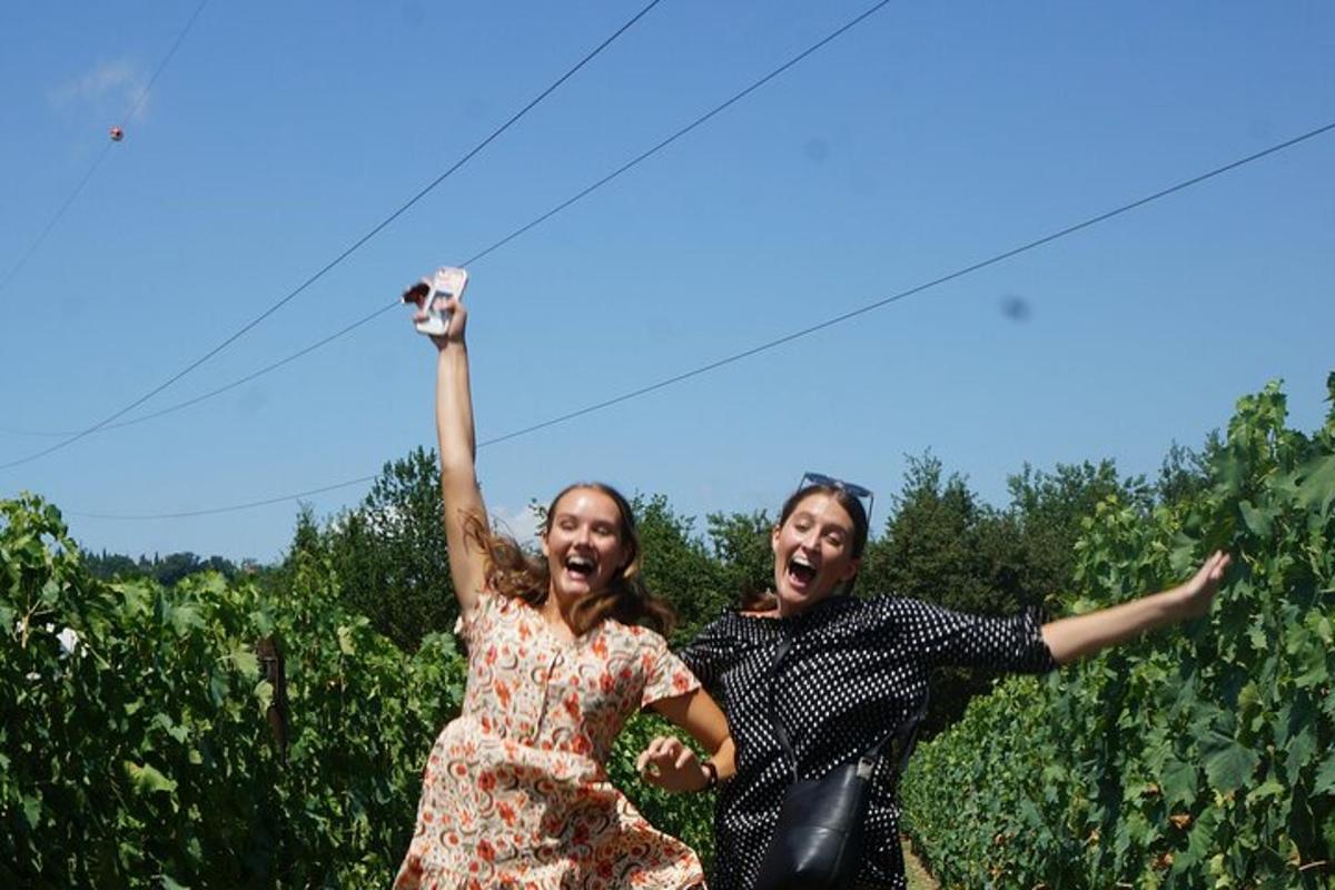 two women jumping in the air with their hands in the air