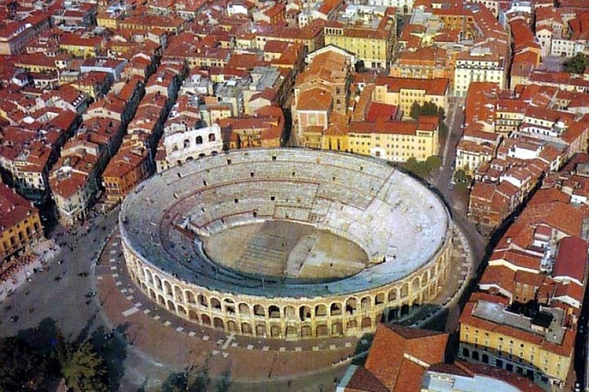 an aerial view of a large amphitheater in a city
