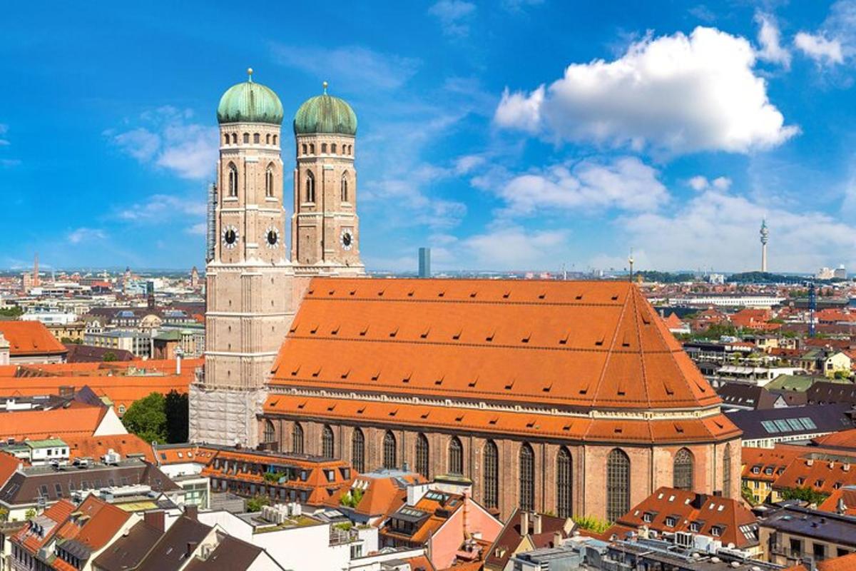 a large building with a clock tower in a city