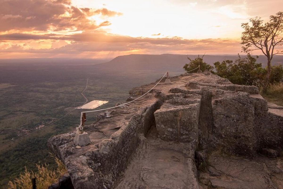 a view from the top of a mountain with the sunset