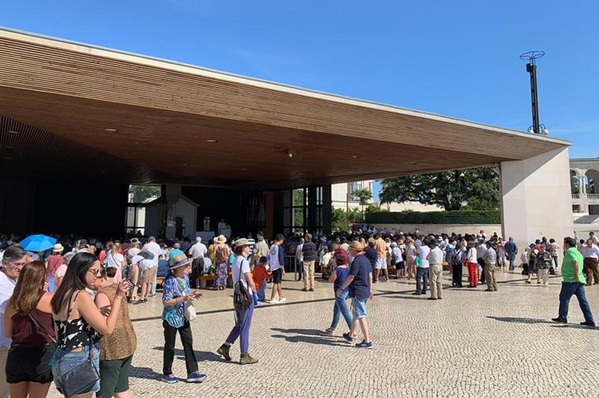 a large crowd of people standing outside of a building