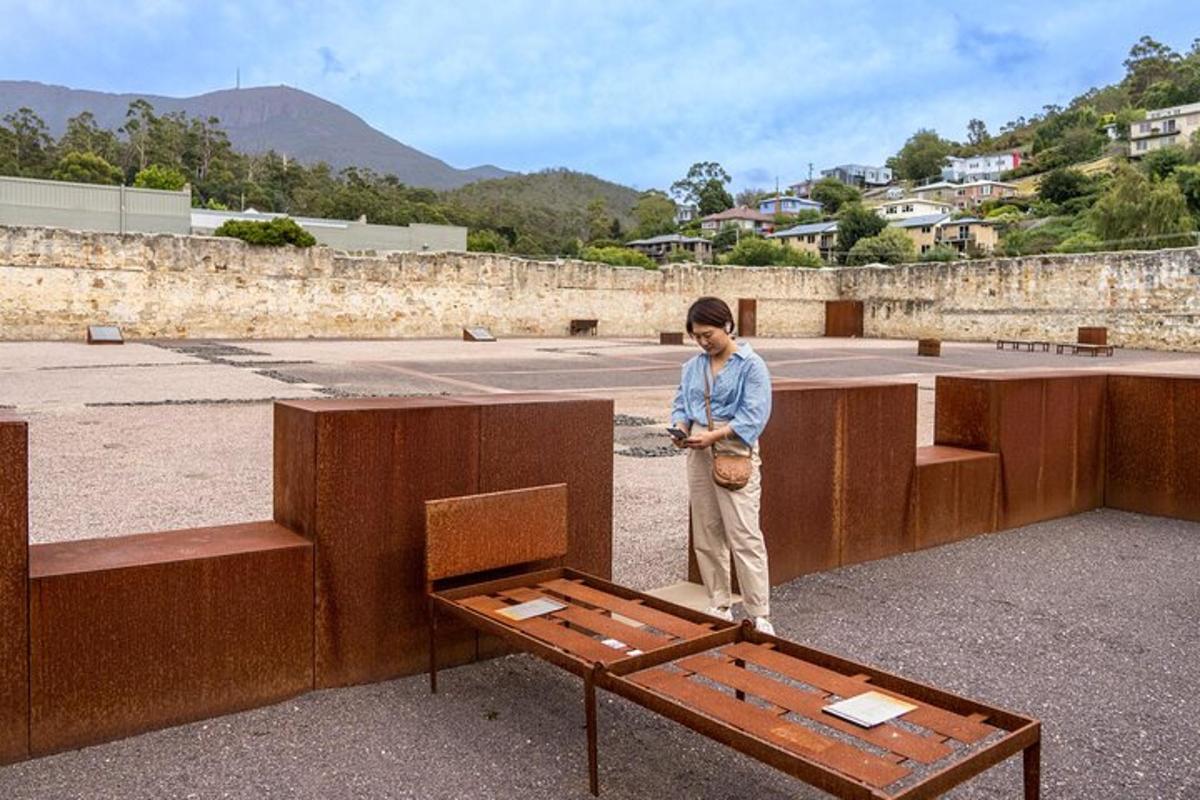 a person standing on top of a wooden bench