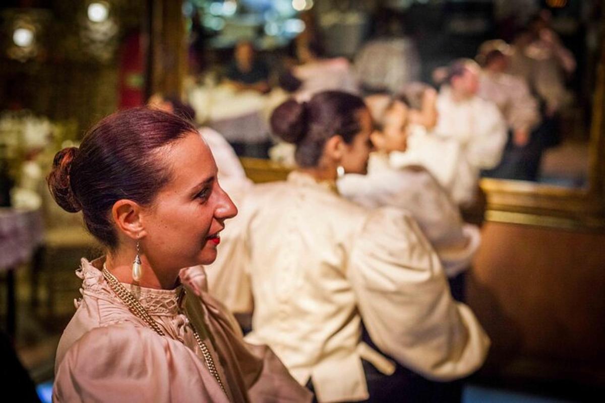 a woman standing in front of a group of people