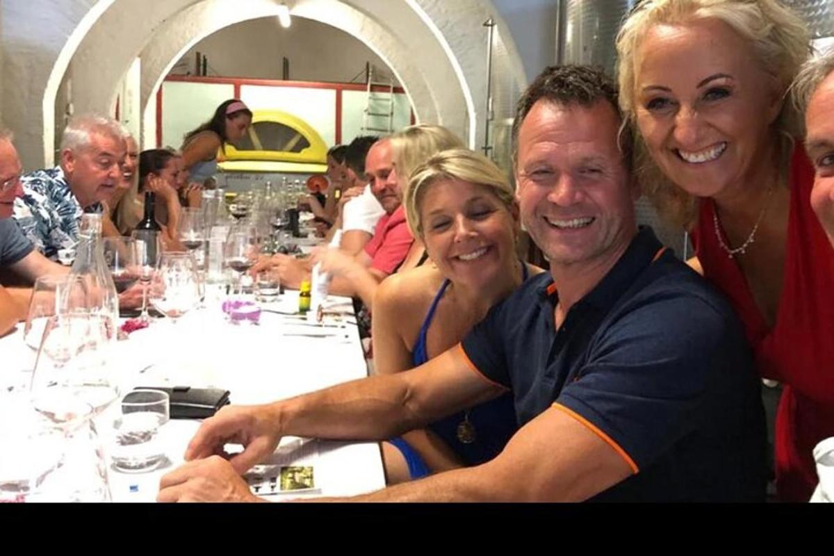 a group of people sitting at a table