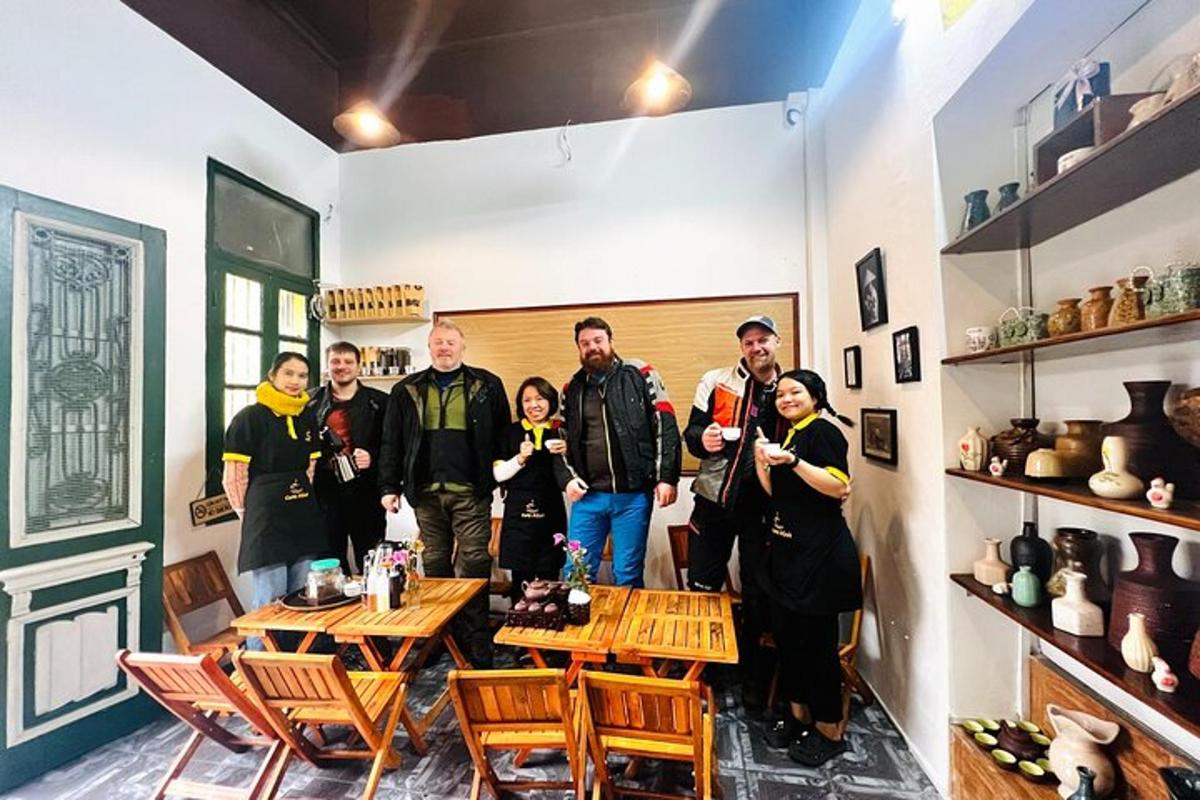 a group of people posing for a picture in a room