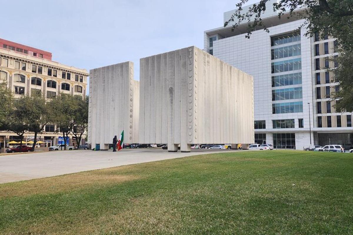 a large white building in front of a building