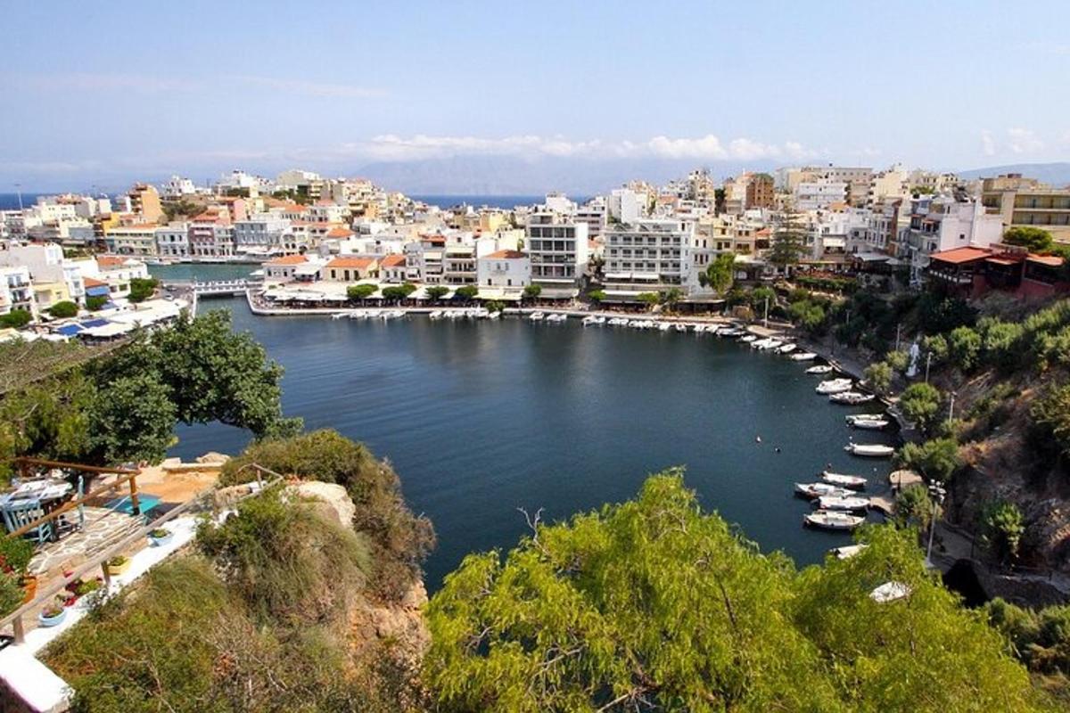 a view of a river with boats in a city