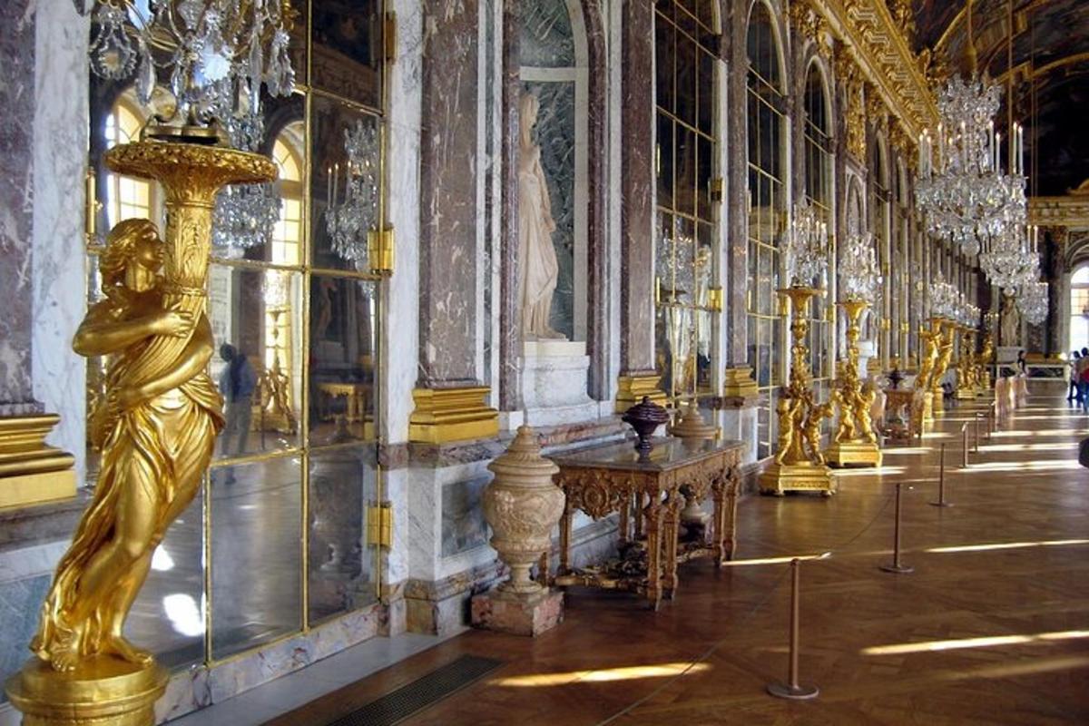 a room filled with gold statues in a building