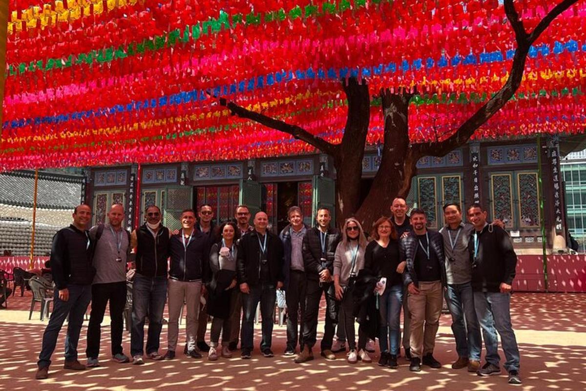 a group of people standing in front of a building