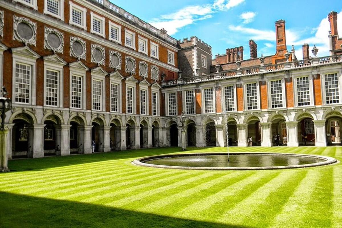 a large building with a fountain in front of it
