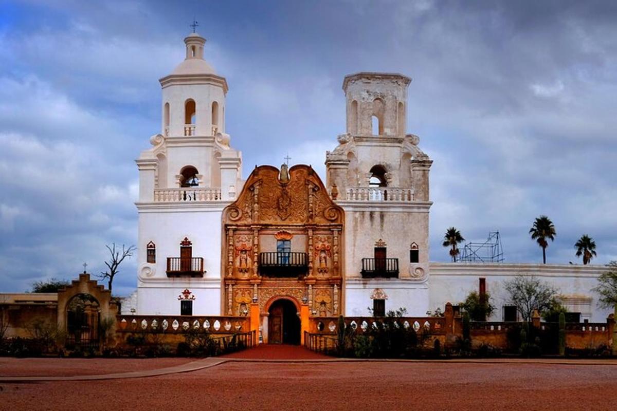 a large white building with two towers