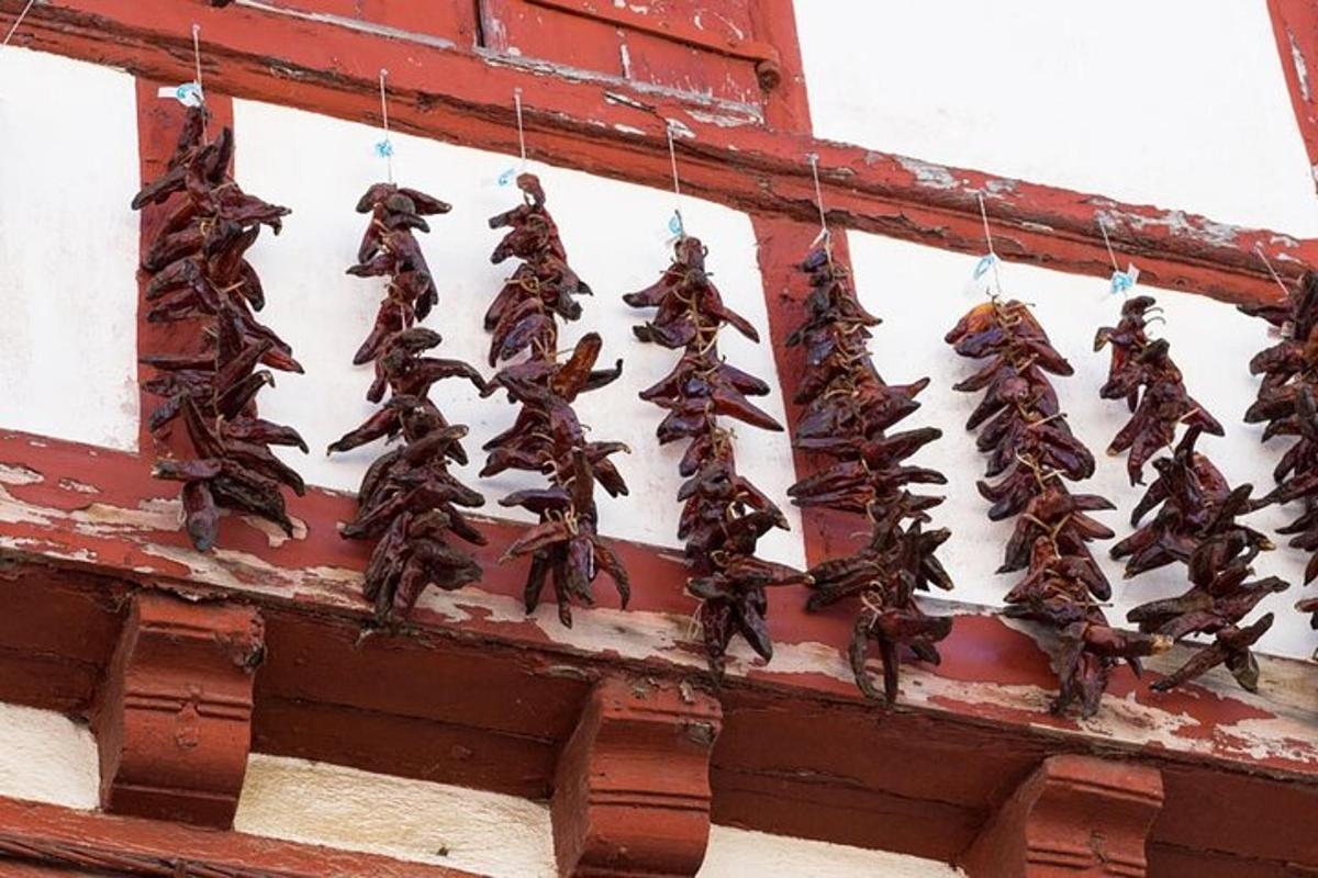 a bunch of dried food hanging on a wall