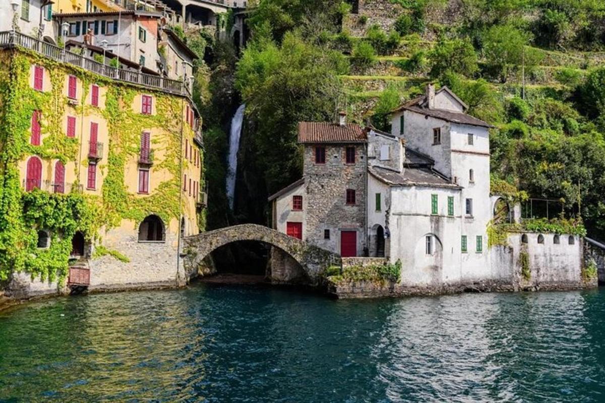 a bridge over a body of water next to buildings