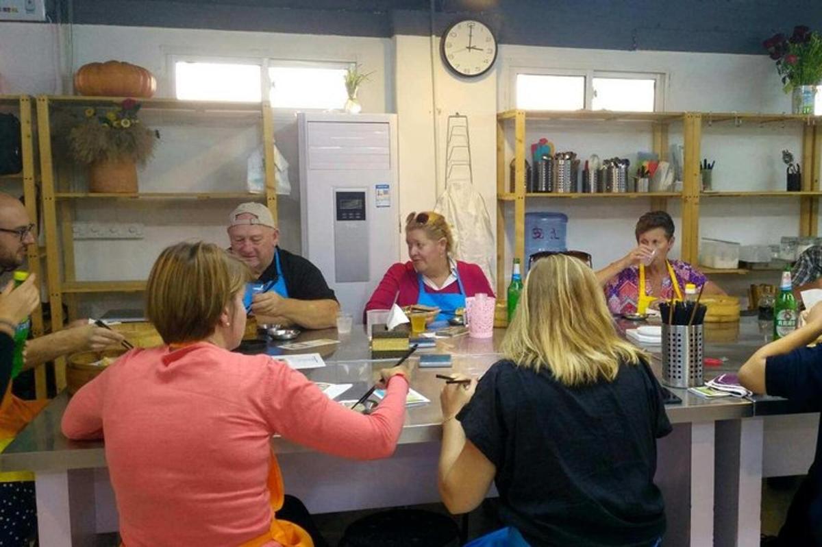 a group of people sitting around a table