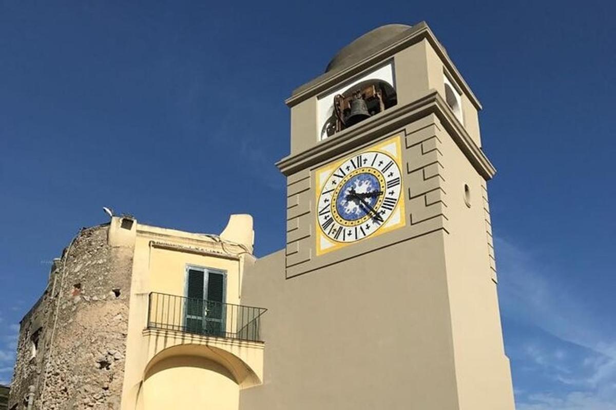 a tower with a clock on the side of a building