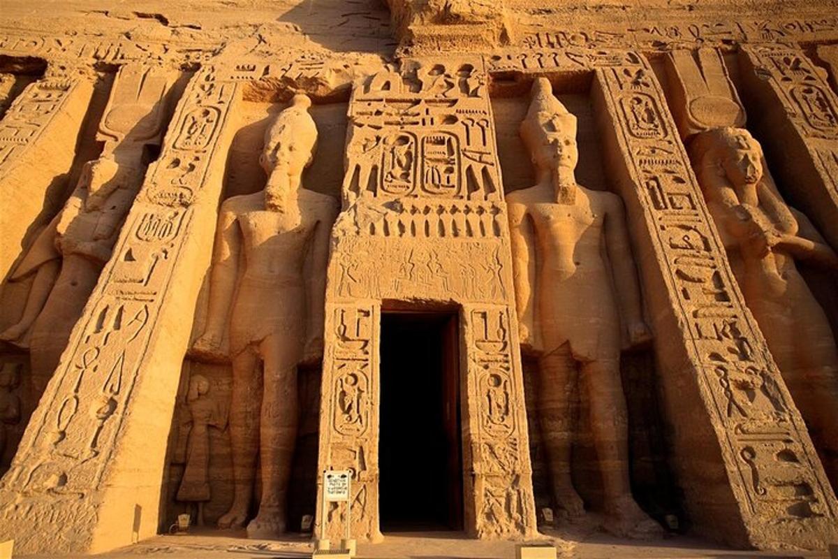 an ancient building with hieroglyphic carvings on it