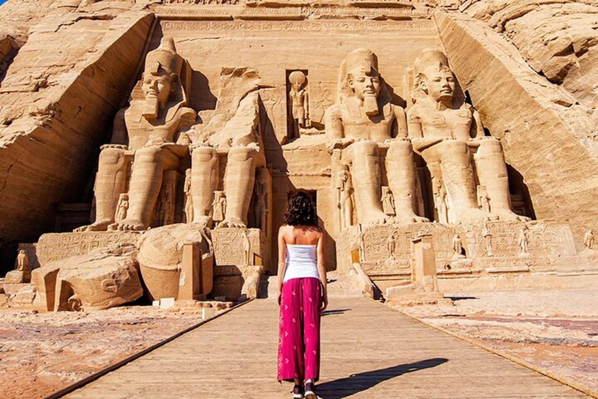 a woman is standing in front of anaraoh