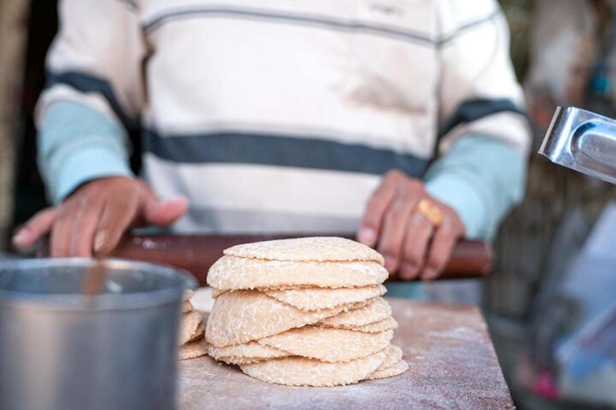 a person is making cookies on a table